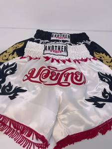 2025 กางเกงขาสั้น MMA ใหม่ สไตล์ชายขอบเล็ก กางเกงต่อสู้ Sanda กางเกงมวยไทย กางเกงต่อสู้