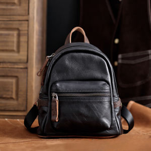 กระเป๋าเป้หนังแท้สไตล์วินเทจสำหรับผู้หญิง ขนาดเล็ก ความจุมาก สีเรทึบ สามารถใส่ขวดน้ำได้