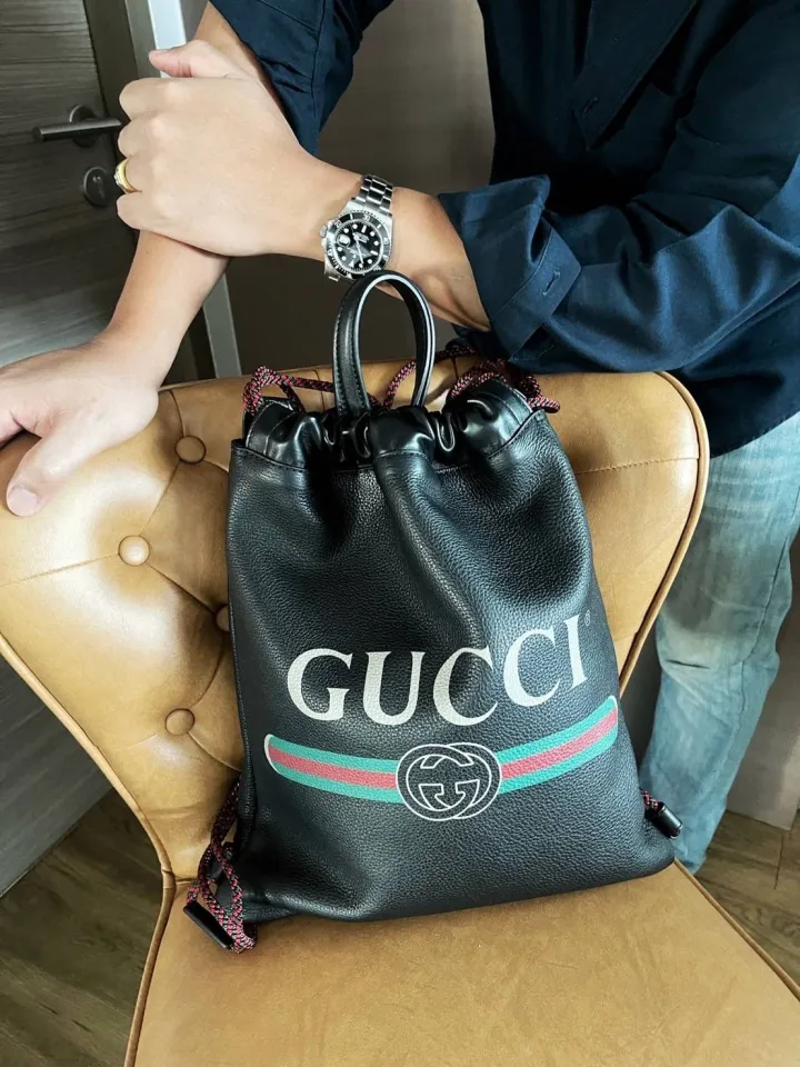 Gucci print leather drawstring backpack best sale