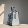 Coach Dempsey Canvas Field Tote 22 women shoulder tote bag. 