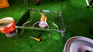 ชั้นวางหม้อสแตนเลส Campingmoon MS-1018 ขนาด 31.5*26*19 มม พับเก็บสะดวก, ป้องกันลม ปรับความสูงได้ 5 ระดับ, รับน้ำหนัก 50 กก, ไม่ให้ภาชนะหล่น