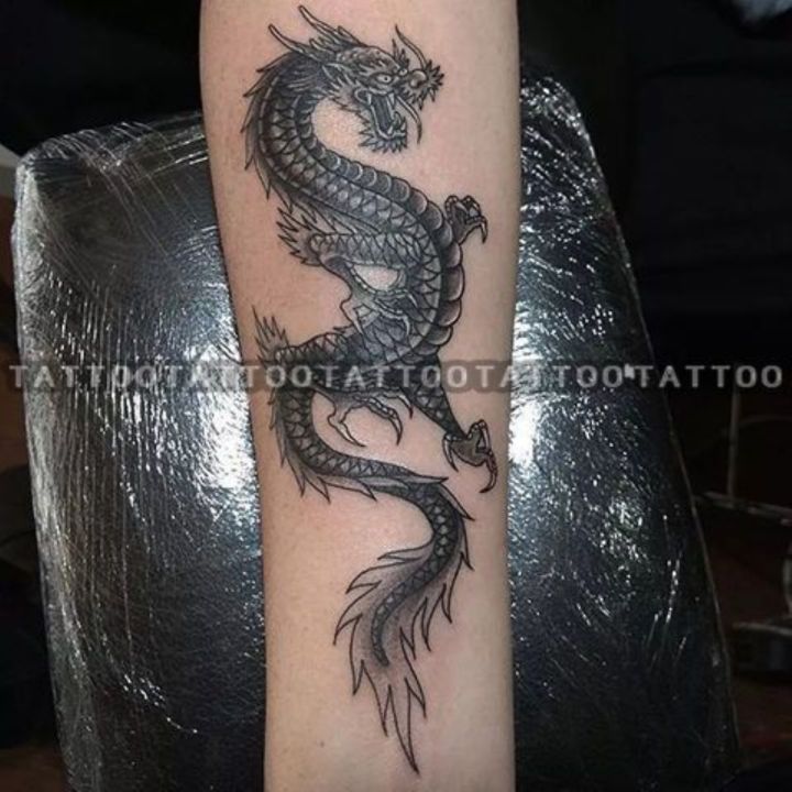 Tattoo uploaded by Forest Lewis • Big ole black dragon for millie. •  Tattoodo
