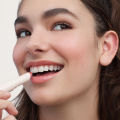 Sunnies Face Lip Treat [Moisturizing Tinted Lip Balm]. 