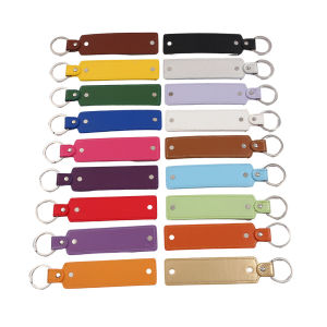 แฟชั่นสีทึบหนังพวงกุญแจแฮนด์เมด diy ประณีตพวงกุญแจเครื่องประดับอุปกรณ์เสริมของขวัญกระเป๋าจี้วัสดุ