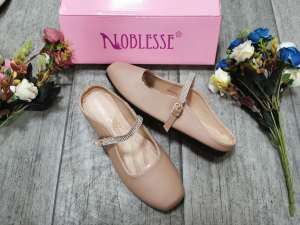 Korean Women wearing soft soled sandals on top of flat toed helf slippers2023