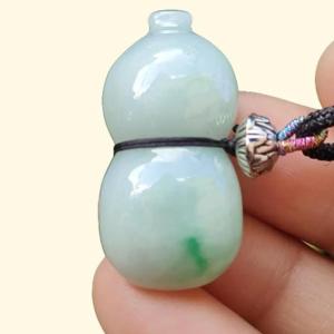 Light Green Natural Type A Jadeite Jade crafted with shape of Gourd as Pendant certificate weighs 8.42 grams measurement 32.9 * 16 * 8.4 mm(pendant252)