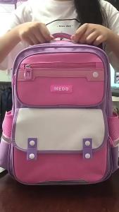 AE Foreign trade school backpacks for boys and girls in grades one to six lightweight and burden-reducing childrens backpacks