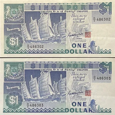 1987 Pair of Singapore Old Notes - Ship Series $1 notes with running serial numbers D5 486302 / D5 486303. Crisp Condition! (JW-218).