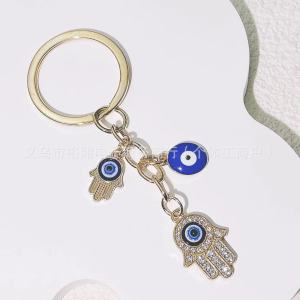 รูปร่างหัวใจ พวงกุญแจ จี้กุญแจ ปกป้องและหลีกเลี่ยงความชั่วร้าย ความสะดวกสบายทางจิต ดึงดูดโชคลาภ องค์ประกอบวัฒนธรรมที่เป็นเอกลักษณ์ พวงกุญแจรูปหัวใจ พวงกุญแจตาปีศาจ ใช้งานได้จริง