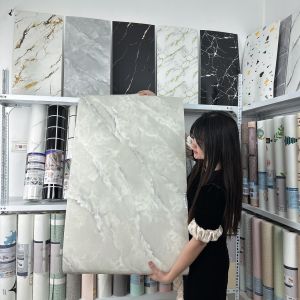 cuộn xốp Pvc vân đá dán tường dài 3 mét rộng 60 cm mặt sau có sẵn keo dán cho tường phẳng mịn và láng nhẵn