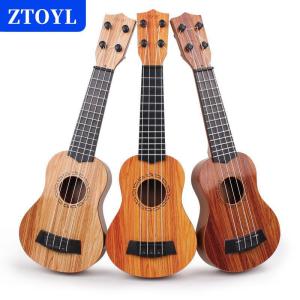 [COD]🔥🔥🔥ZTOYL 1Pcs Learning Educational Gifts 26 35cm Kids Guitar 4 Strings Musical Instrument With Paddles Simulating Yukrili Musical Toy