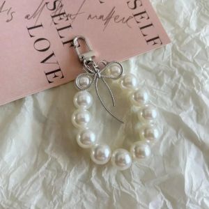 พวงกุญแจประดับจี้ห้อยกระเป๋าถือพวกกุญแจสำหรับกระเป๋าสะพายสำหรับเด็กผู้หญิงผู้หญิงพวงกุญแจประดับตกแต่งสไตล์อินสตาเมติกผูกโบว์เคสหูฟังเสน่ห์