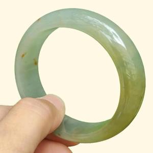 Collectible Authentic Natural Type-A Jadeite-Jade crafted as 53mm Green with Brown and Redish Patches Chaise Oval Bracelet Bangle Certificate weighs 44.36 Width: 13.9mm Thickness: 6.8mm (bangle13)