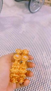 BEAUTIFUL PEARL PREMIUM BANGLES MATTE FINISH WORK WITH GODDESS LAKSHMI BANGLES (2 )