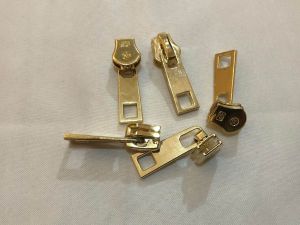 kepala resleting gigi besi no.5 gold isi 100 pcs