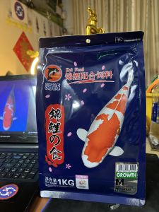 Thức ăn koi Porpoise 1kg size M mẫu mới 2023
