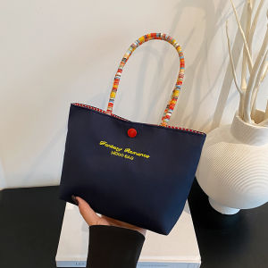 Korean-style canvas bag niche handbag portable with colorful straps eye-catching color contrast practical for touch-ups suitable for going out shoulder bag