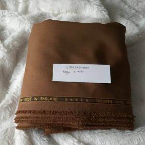 kain pemda khaki woltex kain keki kain meteran kain wool