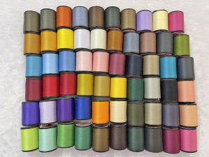 ด้าย ด้ายเย็บผ้า ด้ายสปัน ตราภูเขาไฟ ขายเป็นโหล 12หลอด