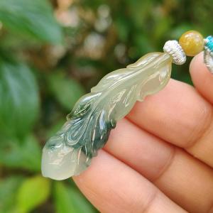 Green with Yellow two colors Natural Type A Jadeite Pendant carved as the Phoenix feather with QIC approved labs certificate weighs 5.83 grams 40.2 * 12.7 * 4.8 mm phoenix feather Symbol of Prosperity and Wealth Harmony Bliss in Marriage (pendant82)