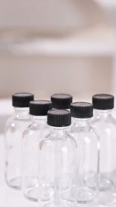 60ml Small Glass Bottle with Lid Leak-Proof Clear Boston Bottle for Juice,Milk Whiskey 1Pc