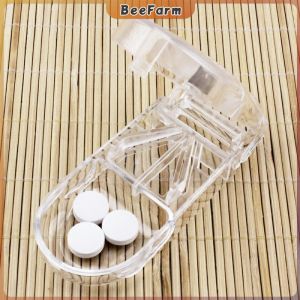 B.F. Square Round Transparent Pill or Tablet Cutter with Medicine Storage