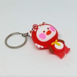 móc khóa búp bê đỏ đèn led