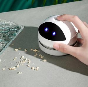 USB Rechargeable Mini Robot Vacuum Cleaner - Cordless Dust Sweeper and Collector for Keyboards and Desks