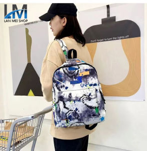 LM SHOP【จัดส่งจากกรุงเทพฯ】กระเป๋าเป้เด็กผู้หญิงรุ่นใหม่ ลายพรางทันสมัย ​​กระเป๋านักเรียนนักเรียนสุดเก๋ เป้พิมพ์ลายกราฟฟิตี้ มี 4 สีให้เลือก