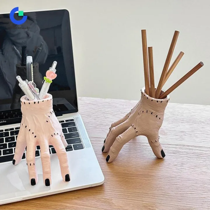 The Horror Hand Pen Holder That Supervises Your Work