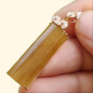 High Quality Brownish Yellow Natural Type A Jadeite Jade crafted as Nothing set on 18k Gold as Pendant certificate weighs 4.49 grams measurement 35 * 10.2 * 6.2 mm (18kp59)