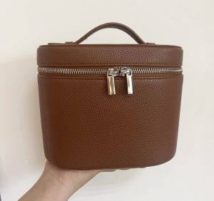 Free Customized New Fashion Handheld PU Leather Makeup Bag Lipstick Skincare Makeup Partition Storage Round Bucket Makeup Bag2026
