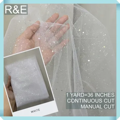 SILENKA GLITTERED FABRIC WITH FALLING GLITTERS TULLE PER YARD IS 36 INCHES LENGTH AND 60 FIXED WIDTH