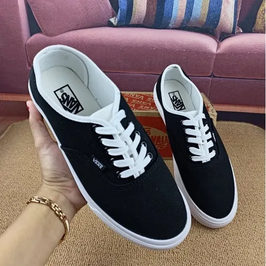 Vans black store bone price