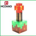 Mô hình Minecraft cục đất - đá đỏ - đuốc. 