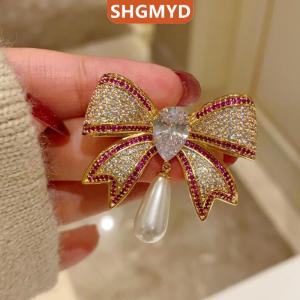 [COD] SHGMYD SPORTS เข็มกลัดติดโบว์ประดับพลอยเทียมอารมณ์สำหรับผู้หญิงแฟชั่นสาวๆเข็มกลัดชุดสูทหรูหราของขวัญเสื้อผ้า