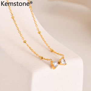 Kemstone สร้อยคอโซ่ลูกปัดสแตนเลสเพทายโบว์โบว์เครื่องประดับสร้อยคอจี้ชุบทองสำหรับผู้หญิง