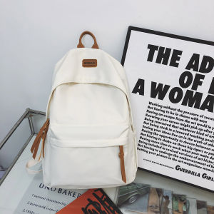 กระเป๋านักเรียนสีทึบ 2024 ผู้หญิงเกาหลีแบบเรียบง่ายร้อยชุดนักเรียนมัธยมศึกษาตอนต้นนักเรียนกระเป๋าเป้สะพายหลังความจุขนาดใหญ่