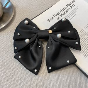 กิ๊บติดผมรูปโบว์สำหรับผู้หญิง MODE Korea หวีเสียบผมไข่มุกปิ่นปักผมหรูหราเครื่องประดับผมสำหรับเด็กผู้หญิง