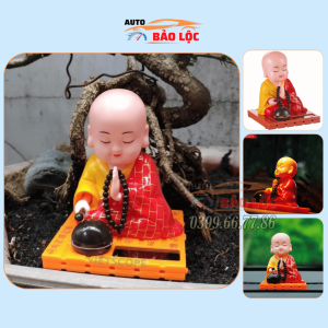 Tượng phật gõ mõ năng lượng mặt trời trang trí taplo xe hơi phòng làm việc
