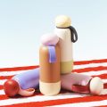 Sunnies Flask 32oz Pebble Flask in Milk Tea (Summer Ready-Made Insulated Water Tumbler for Hot and Cold with Cap and Strap). 
