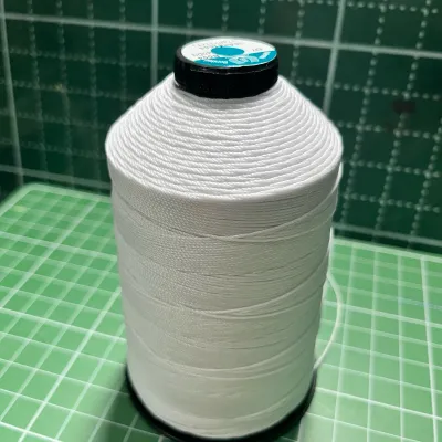 Chỉ nilong trắng 840/3 sợi 08mm dùng trong may giày da ba lô túi xách mui bạcchỉ mới chưa qua sử dụng