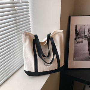 QZshop สินค้าใหม่ กระเป๋าผ้าสะพายไหล่ งานดีเทลแฟชั่นเกาหลีใบใหญ่ใส่ของได้เยอะมากๆมีช่องการใช้งานด้านหน้าให้ด้วยน๊าราคาโคตรดี ไม่มีพลาดมาก