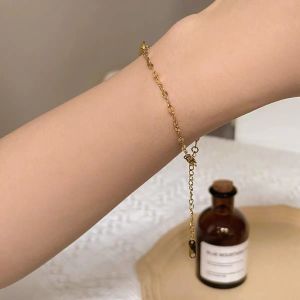 Lắc tay nữ inox Thấy là Thích kiểu lá me vàng Cam kết 1 đổi 1 nếu đen và gỉ sét