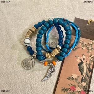 [COD] ZNPNXN 5pcs Bohemian Multi-Layer Rice Bead Bracelet Wings Pendant Elastic Rope Bracelet Ethnic Style Jewelry