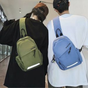 KODUS จุได้มาก กระเป๋าหน้าอกไนลอน สีทึบทึบ มัลติฟังก์ชั่ กระเป๋าสะพายไหล่ Crossbody เย็นเย็น สไตล์เกาหลีแบบ เป้สะพายหลังกีฬา ตัวผู้ผู้