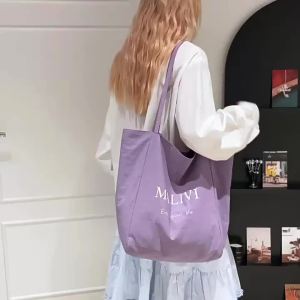 New double-sided model 2026 Trendy Design Leopard Print Canvas Casual Large Capacity Womens Commuting Tote Shoulder Bag