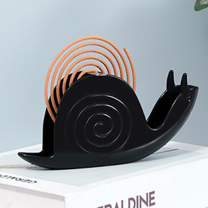 1ชิ้นที่วางขดลวดกันยุงหอยทากทากที่ใส่ยากันยุงแบบขดกันยุงในครัวเรือนแท่นจุดเครื่องหอมม้วนยุงรูปหอยทากน่ารักสำหรับของตกแต่งห้องนอนในบ้าน