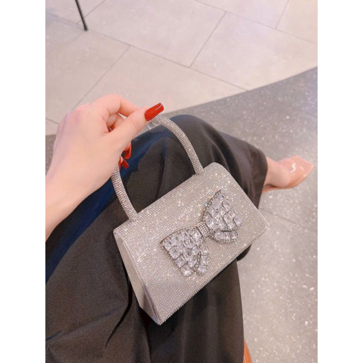 Túi cầm tay đi tiệc Bling đính nơ sang trọng và nổi bật. Phù hợp làm ...