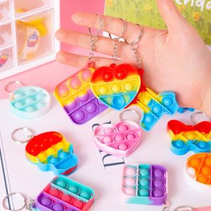 Ready stock Finger press bubble music decompression play childrens toys small decompression rainbow keychain pendant